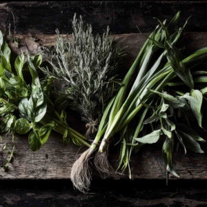 Linguine and basil on a chopping board